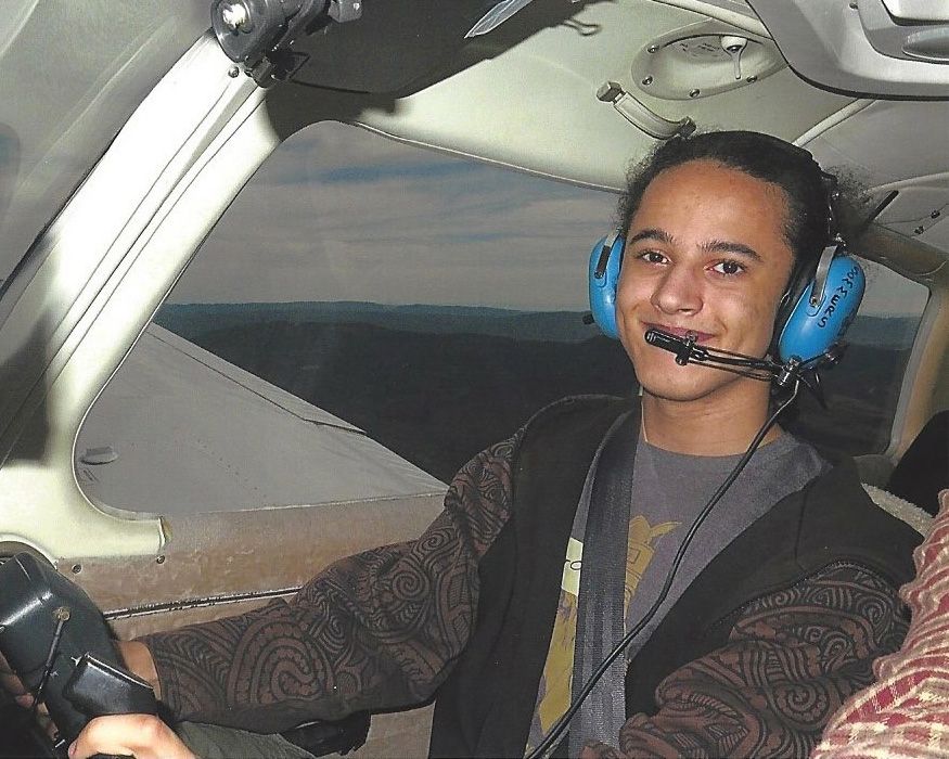 young eagle at the controls of a small aircraft